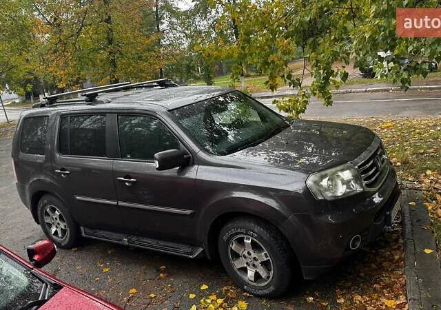 Коричневий Хонда Пілот, об'ємом двигуна 3.47 л та пробігом 187 тис. км за 14500 $, фото 7 на Automoto.ua