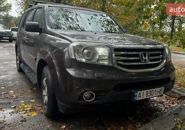 Коричневий Хонда Пілот, об'ємом двигуна 3.47 л та пробігом 187 тис. км за 14500 $, фото 8 на Automoto.ua