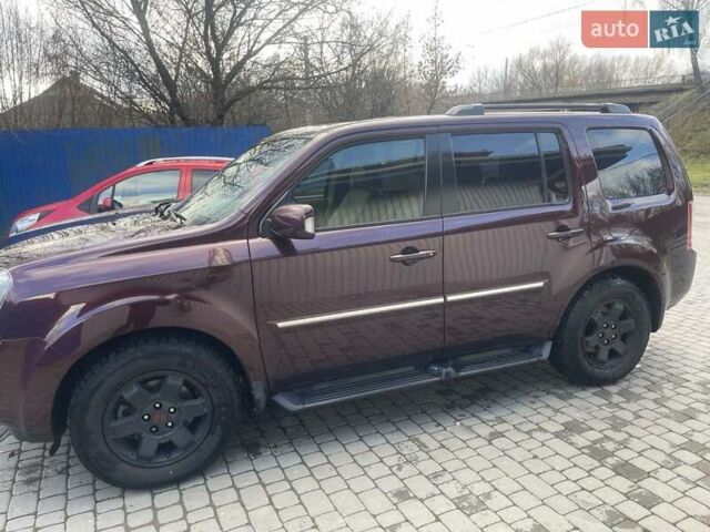 Червоний Хонда Пілот, об'ємом двигуна 3.47 л та пробігом 350 тис. км за 11500 $, фото 16 на Automoto.ua