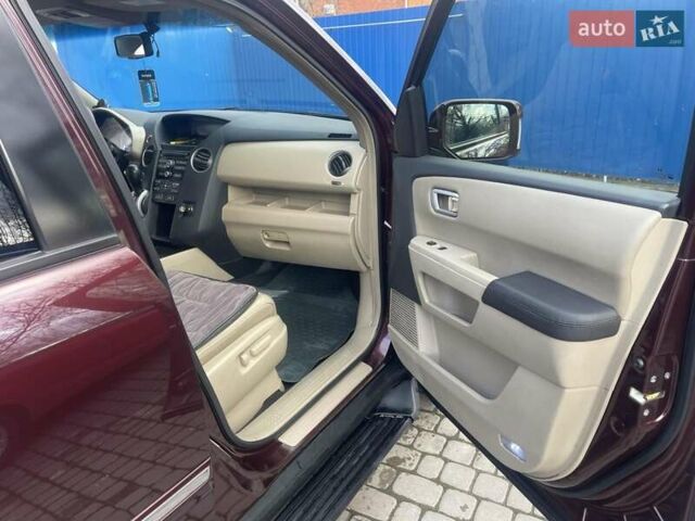 Червоний Хонда Пілот, об'ємом двигуна 3.47 л та пробігом 350 тис. км за 11500 $, фото 15 на Automoto.ua