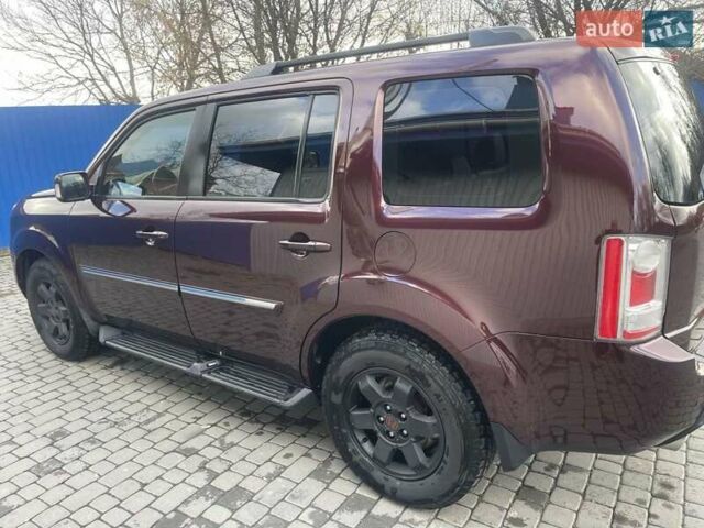 Червоний Хонда Пілот, об'ємом двигуна 3.47 л та пробігом 350 тис. км за 11500 $, фото 24 на Automoto.ua