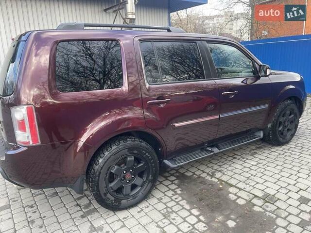 Червоний Хонда Пілот, об'ємом двигуна 3.47 л та пробігом 350 тис. км за 11500 $, фото 22 на Automoto.ua