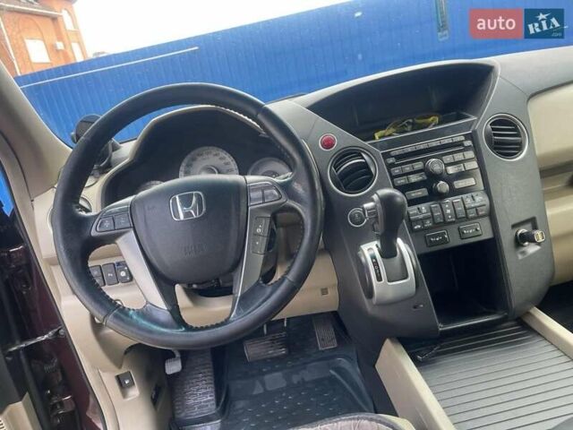 Червоний Хонда Пілот, об'ємом двигуна 3.47 л та пробігом 350 тис. км за 11500 $, фото 23 на Automoto.ua