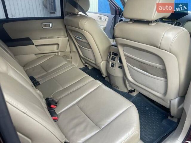 Червоний Хонда Пілот, об'ємом двигуна 3.47 л та пробігом 350 тис. км за 11500 $, фото 12 на Automoto.ua