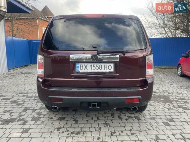 Червоний Хонда Пілот, об'ємом двигуна 3.47 л та пробігом 350 тис. км за 11500 $, фото 26 на Automoto.ua