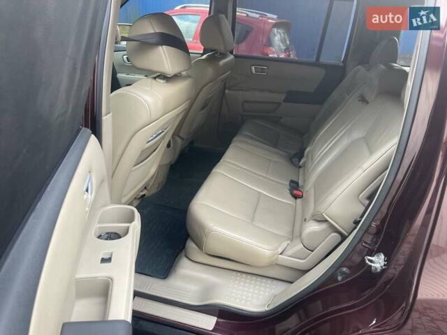 Червоний Хонда Пілот, об'ємом двигуна 3.47 л та пробігом 350 тис. км за 11500 $, фото 6 на Automoto.ua