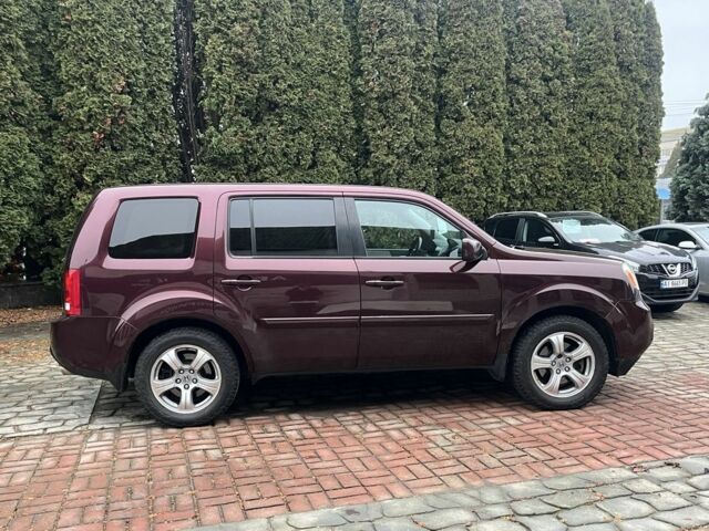 Красный Хонда Пилот, объемом двигателя 3.5 л и пробегом 152 тыс. км за 13999 $, фото 2 на Automoto.ua