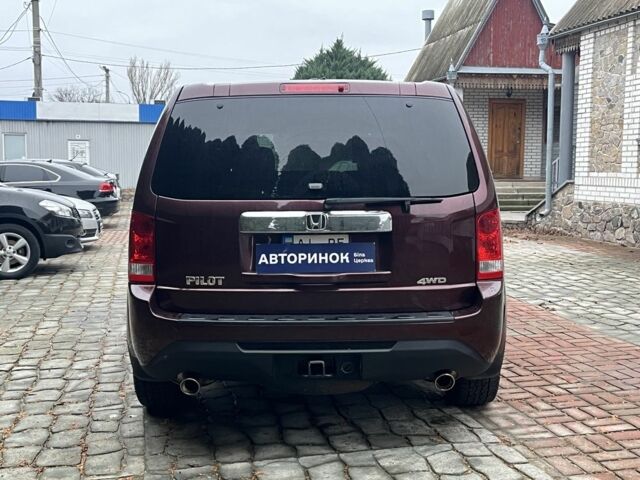 Красный Хонда Пилот, объемом двигателя 3.5 л и пробегом 152 тыс. км за 13999 $, фото 4 на Automoto.ua