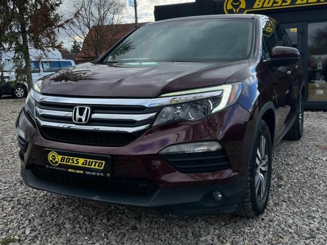 Красный Хонда Пилот, объемом двигателя 3.5 л и пробегом 246 тыс. км за 17300 $, фото 2 на Automoto.ua