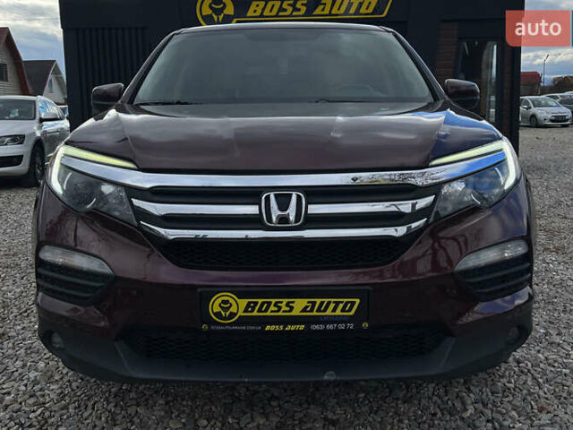 Красный Хонда Пилот, объемом двигателя 3.47 л и пробегом 246 тыс. км за 17300 $, фото 1 на Automoto.ua