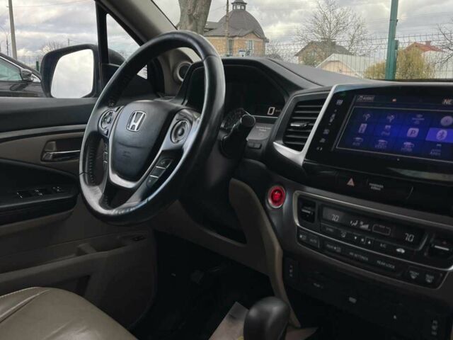 Красный Хонда Пилот, объемом двигателя 3.5 л и пробегом 246 тыс. км за 17300 $, фото 18 на Automoto.ua