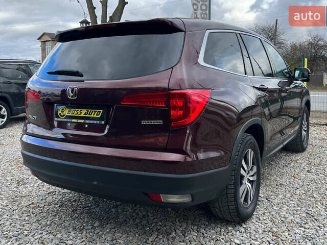 Красный Хонда Пилот, объемом двигателя 3.47 л и пробегом 246 тыс. км за 17300 $, фото 6 на Automoto.ua