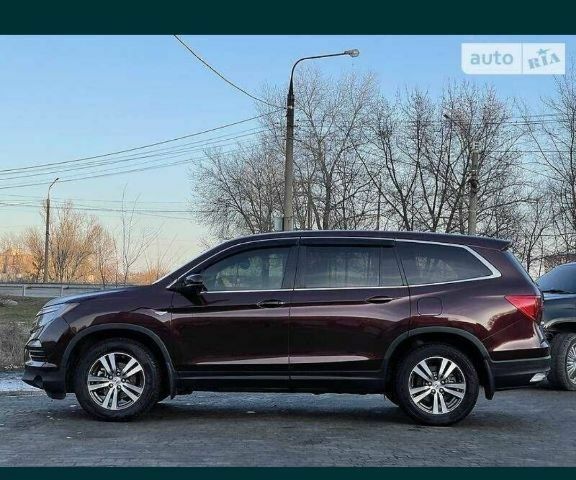 Красный Хонда Пилот, объемом двигателя 0 л и пробегом 180 тыс. км за 23400 $, фото 4 на Automoto.ua