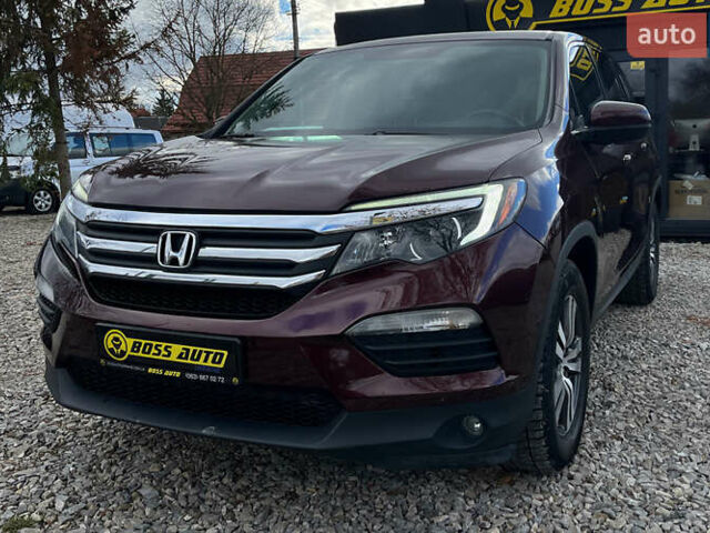 Красный Хонда Пилот, объемом двигателя 3.47 л и пробегом 246 тыс. км за 17300 $, фото 2 на Automoto.ua