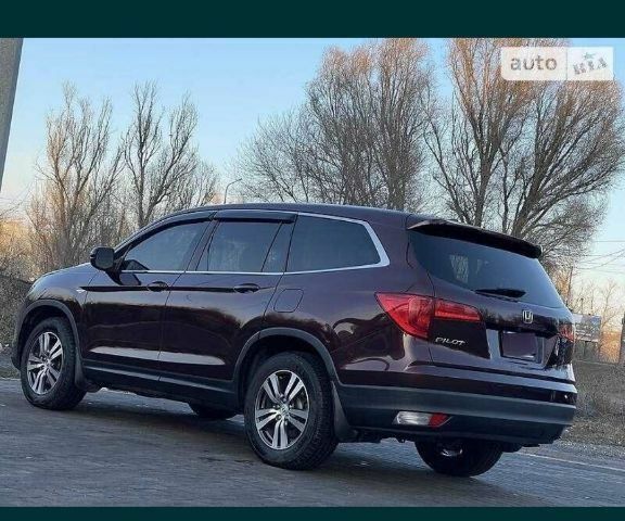 Красный Хонда Пилот, объемом двигателя 0 л и пробегом 180 тыс. км за 23400 $, фото 3 на Automoto.ua
