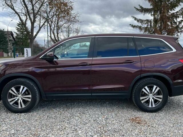 Красный Хонда Пилот, объемом двигателя 3.5 л и пробегом 246 тыс. км за 17300 $, фото 3 на Automoto.ua