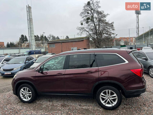 Красный Хонда Пилот, объемом двигателя 3.47 л и пробегом 179 тыс. км за 19999 $, фото 3 на Automoto.ua