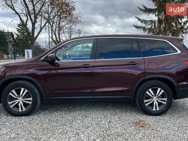 Красный Хонда Пилот, объемом двигателя 3.47 л и пробегом 246 тыс. км за 17300 $, фото 3 на Automoto.ua