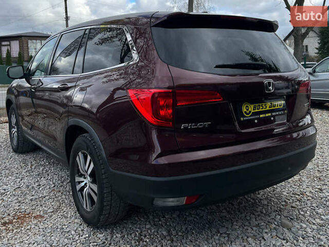 Красный Хонда Пилот, объемом двигателя 3.47 л и пробегом 246 тыс. км за 17300 $, фото 4 на Automoto.ua