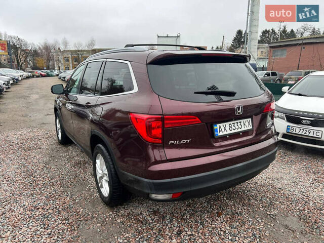 Красный Хонда Пилот, объемом двигателя 3.47 л и пробегом 179 тыс. км за 19999 $, фото 4 на Automoto.ua