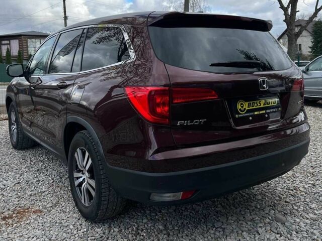 Красный Хонда Пилот, объемом двигателя 3.5 л и пробегом 246 тыс. км за 17300 $, фото 4 на Automoto.ua