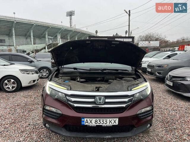 Красный Хонда Пилот, объемом двигателя 3.47 л и пробегом 179 тыс. км за 19999 $, фото 11 на Automoto.ua