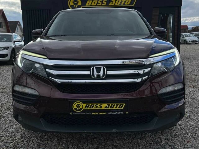 Красный Хонда Пилот, объемом двигателя 3.5 л и пробегом 246 тыс. км за 17300 $, фото 1 на Automoto.ua