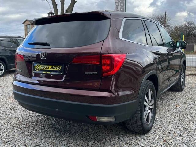 Красный Хонда Пилот, объемом двигателя 3.5 л и пробегом 246 тыс. км за 17300 $, фото 6 на Automoto.ua