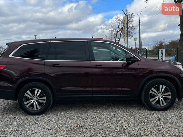 Красный Хонда Пилот, объемом двигателя 3.47 л и пробегом 246 тыс. км за 17300 $, фото 7 на Automoto.ua