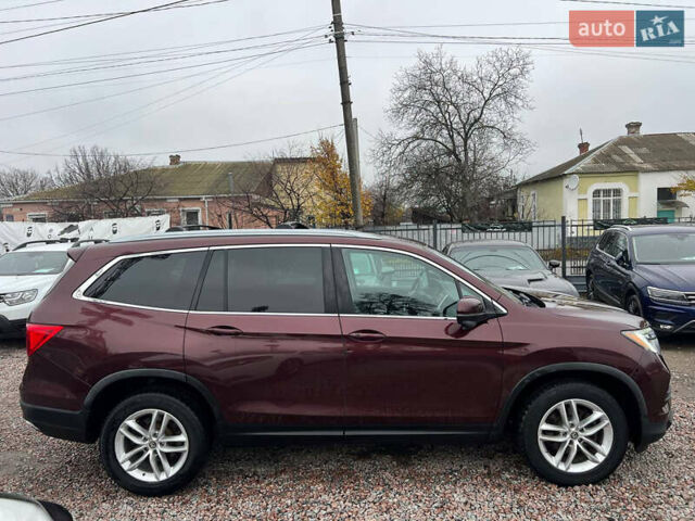 Красный Хонда Пилот, объемом двигателя 3.47 л и пробегом 179 тыс. км за 19999 $, фото 6 на Automoto.ua