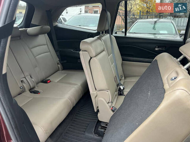 Красный Хонда Пилот, объемом двигателя 3.47 л и пробегом 179 тыс. км за 19999 $, фото 16 на Automoto.ua