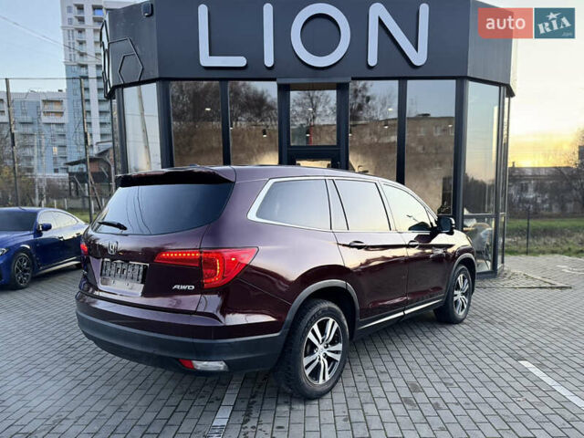 Красный Хонда Пилот, объемом двигателя 3.47 л и пробегом 138 тыс. км за 18899 $, фото 6 на Automoto.ua