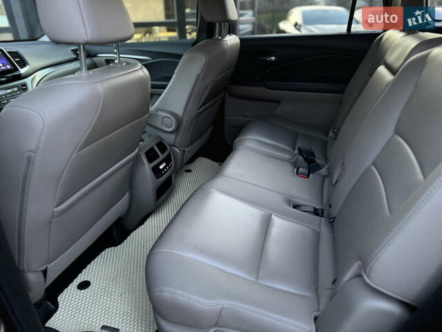 Красный Хонда Пилот, объемом двигателя 3.47 л и пробегом 138 тыс. км за 18899 $, фото 13 на Automoto.ua