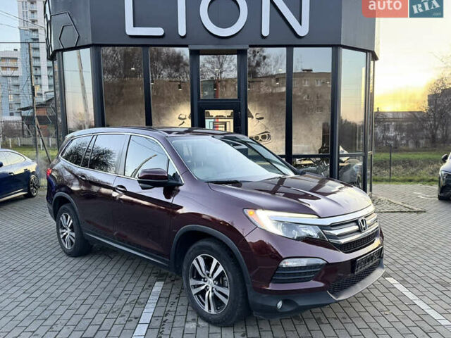 Красный Хонда Пилот, объемом двигателя 3.47 л и пробегом 138 тыс. км за 18899 $, фото 1 на Automoto.ua