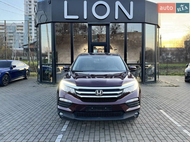 Красный Хонда Пилот, объемом двигателя 3.47 л и пробегом 138 тыс. км за 18899 $, фото 2 на Automoto.ua