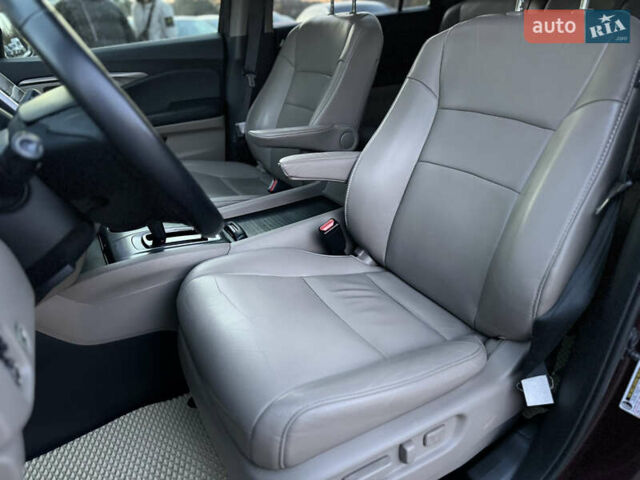 Красный Хонда Пилот, объемом двигателя 3.47 л и пробегом 138 тыс. км за 18899 $, фото 9 на Automoto.ua