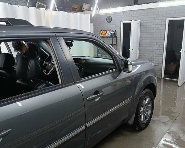 Сірий Хонда Пілот, об'ємом двигуна 3.5 л та пробігом 239 тис. км за 13000 $, фото 7 на Automoto.ua
