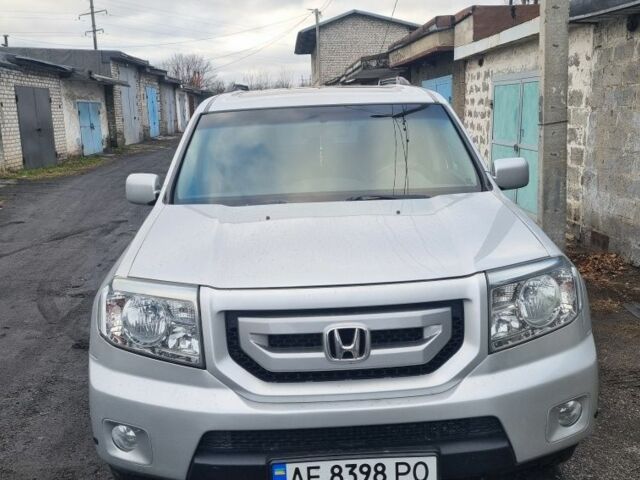 Серый Хонда Пилот, объемом двигателя 3.5 л и пробегом 250 тыс. км за 12000 $, фото 3 на Automoto.ua