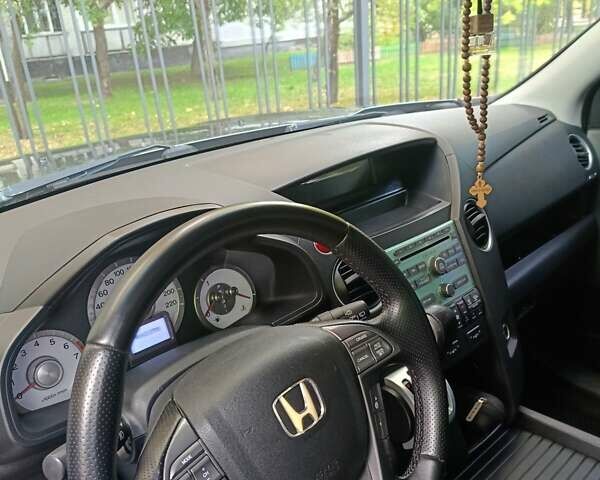Сірий Хонда Пілот, об'ємом двигуна 3.5 л та пробігом 239 тис. км за 13000 $, фото 6 на Automoto.ua