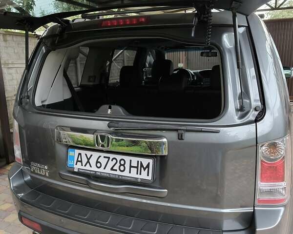 Сірий Хонда Пілот, об'ємом двигуна 3.5 л та пробігом 141 тис. км за 13200 $, фото 6 на Automoto.ua