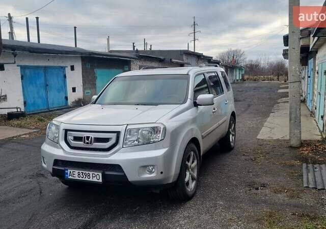 Серый Хонда Пилот, объемом двигателя 3.5 л и пробегом 250 тыс. км за 12000 $, фото 16 на Automoto.ua