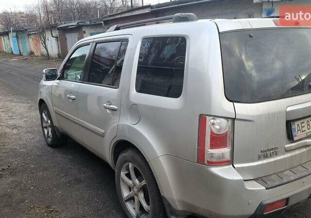 Серый Хонда Пилот, объемом двигателя 3.5 л и пробегом 250 тыс. км за 12000 $, фото 9 на Automoto.ua