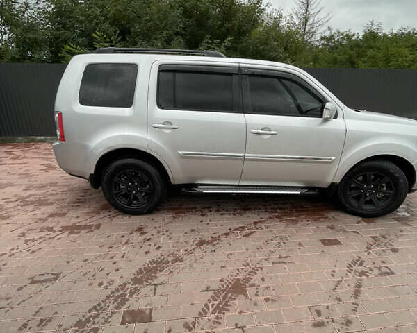 Сірий Хонда Пілот, об'ємом двигуна 3.47 л та пробігом 211 тис. км за 11500 $, фото 4 на Automoto.ua