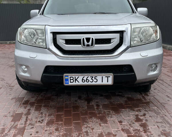 Сірий Хонда Пілот, об'ємом двигуна 3.47 л та пробігом 211 тис. км за 11500 $, фото 1 на Automoto.ua