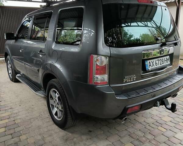 Сірий Хонда Пілот, об'ємом двигуна 3.5 л та пробігом 141 тис. км за 13200 $, фото 4 на Automoto.ua