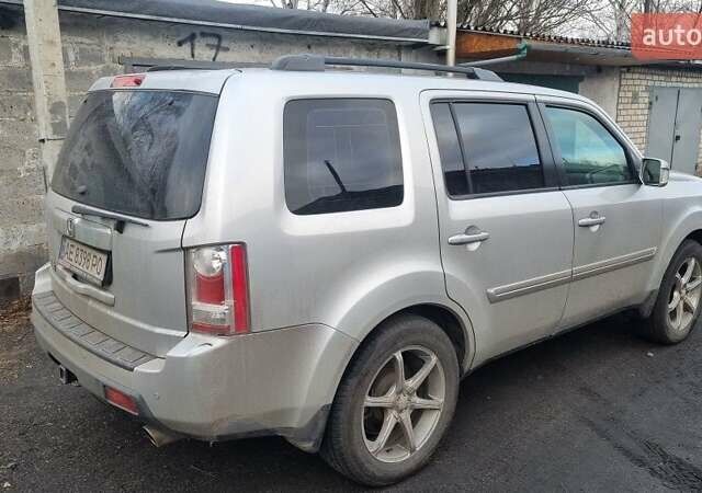 Серый Хонда Пилот, объемом двигателя 3.5 л и пробегом 250 тыс. км за 12000 $, фото 5 на Automoto.ua