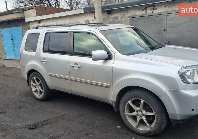 Серый Хонда Пилот, объемом двигателя 3.5 л и пробегом 250 тыс. км за 12000 $, фото 4 на Automoto.ua