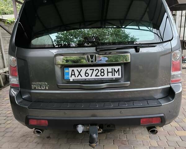 Сірий Хонда Пілот, об'ємом двигуна 3.5 л та пробігом 141 тис. км за 13200 $, фото 5 на Automoto.ua