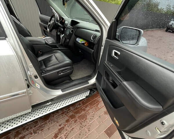 Сірий Хонда Пілот, об'ємом двигуна 3.47 л та пробігом 211 тис. км за 11500 $, фото 17 на Automoto.ua