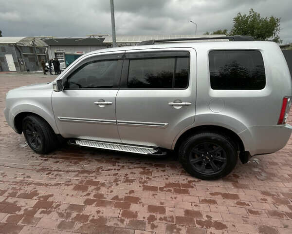 Сірий Хонда Пілот, об'ємом двигуна 3.47 л та пробігом 211 тис. км за 11500 $, фото 8 на Automoto.ua